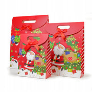 Papierowe torby świąteczne z motywem Mikołaja